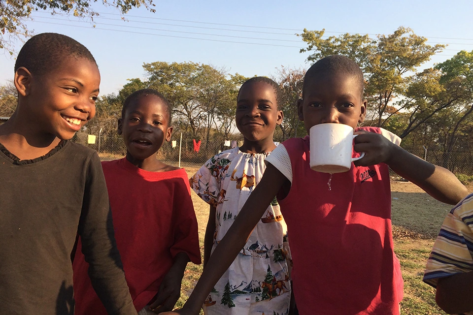 children-drinking-fresh-water.webp